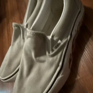 Vans White Canvas Slip-On Sneakers with Subtle Side Tab